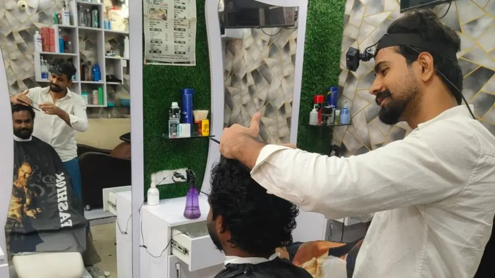 Indian workers training AI